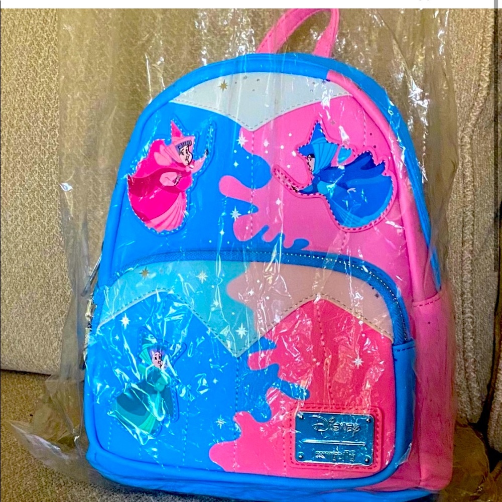 ISOmake it pink make it blue loungefly backpack. Preferably not at scalperprices